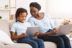 Caring mom providing children's online safety